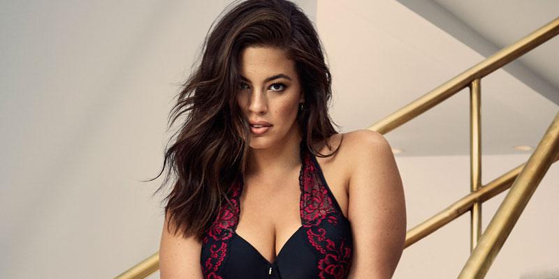 Ashley Graham covers her cleavage with a golden bust for lingerie shoot