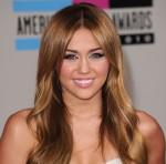 2010__12__Miley_Cyrus_Dec10newsnea 150×148.jpg