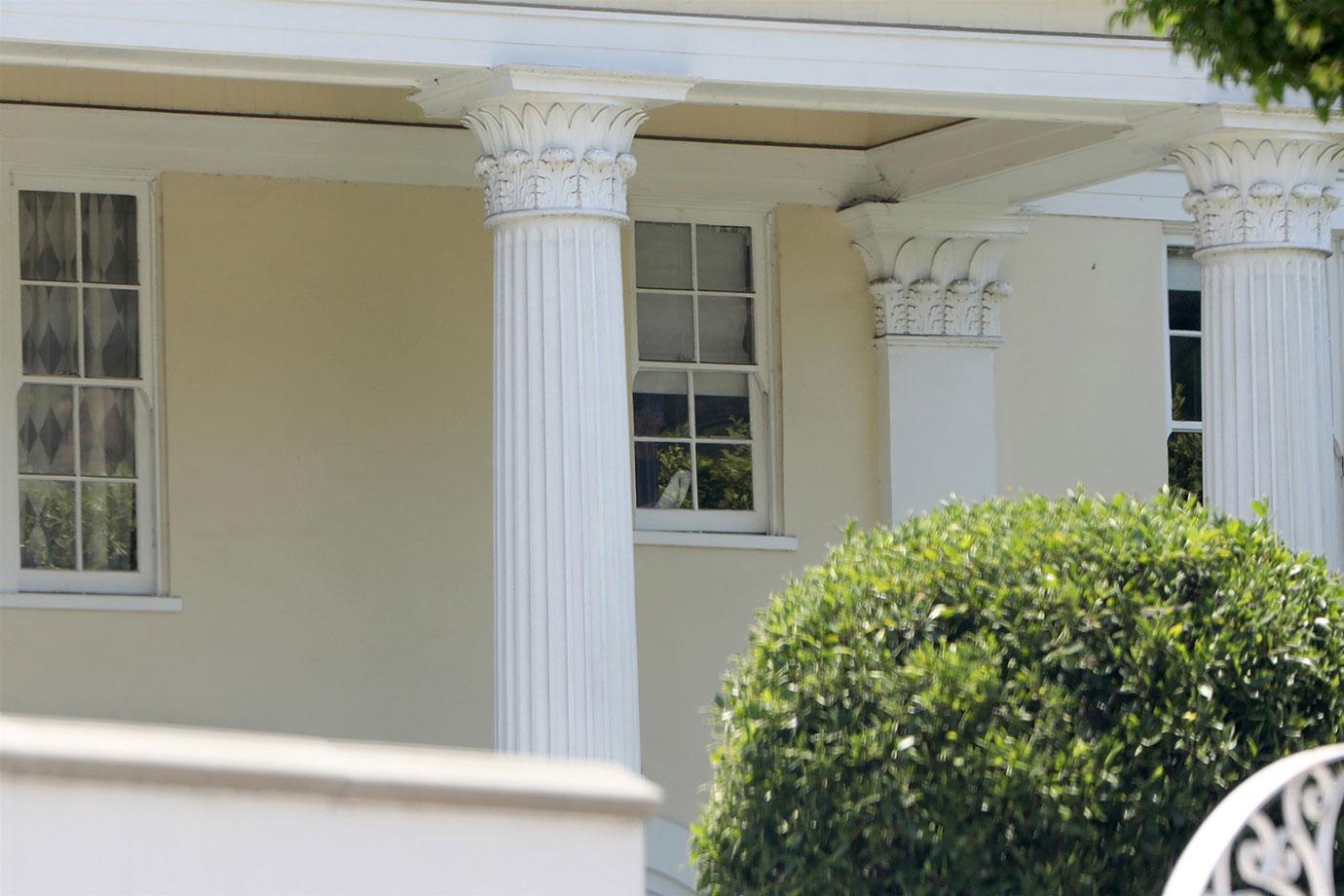 *EXCLUSIVE* A lonely birthday? Richard Simmons&#8217; longtime caretaker, Teresa Reveles spends the day cleaning windows, as deliveries are made thru out the day.