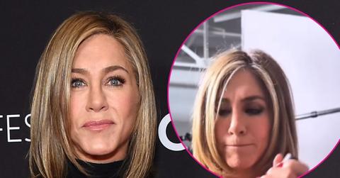 jennifer aniston gray top nipples