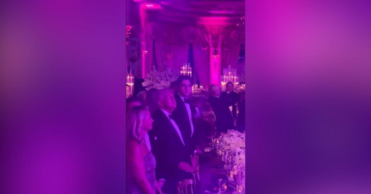 image of While adults appeared upbeat, Barron Trump stood nearby looking noticeably unimpressed.