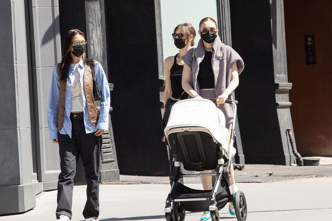 bella hadid and gigi hadid enjoy a leisurely stroll with gigi's daughter  khai in new york city-201022_3