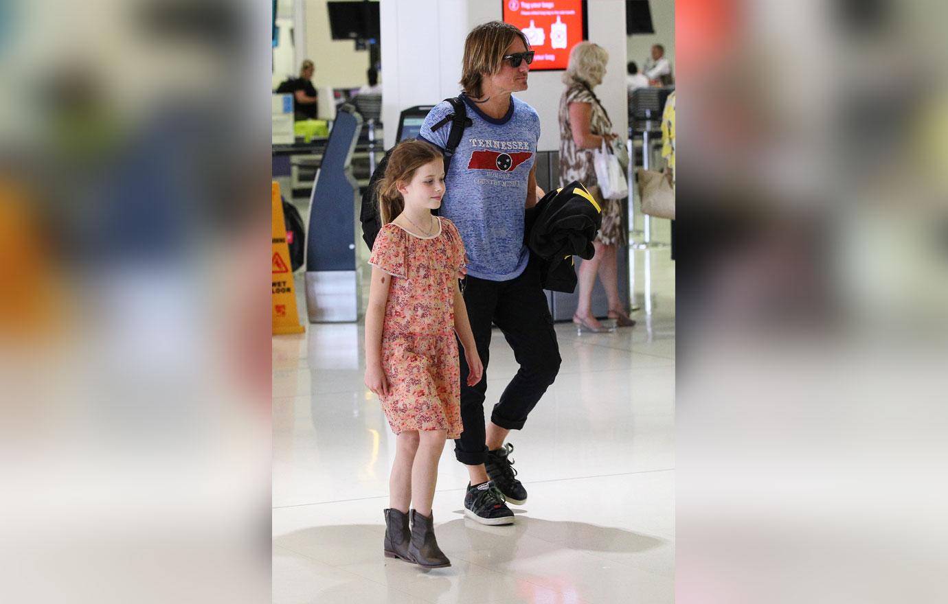 EXCLUSIVE: Keith Urban, Faith Margaret Kidman and Sunday Rose pictured leaving Sydney.