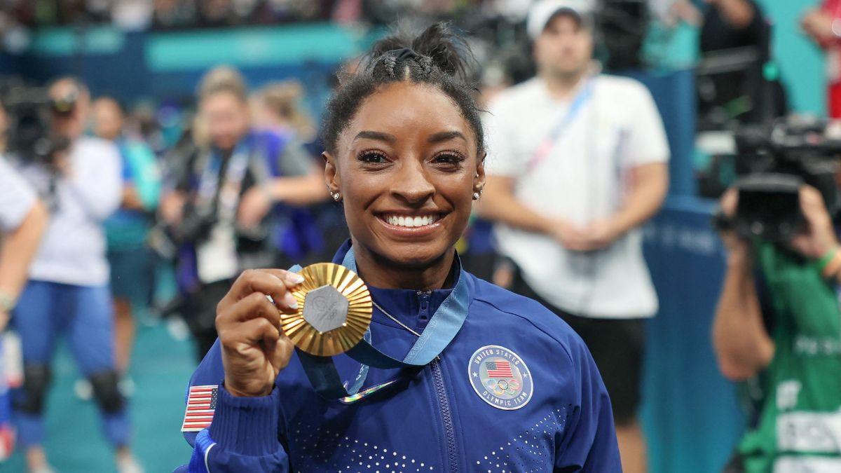 Image of Simone Biles credited her parents and coaches who helped her keep a healthy perspective throughout her gymnastics career.