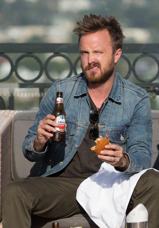 EXCLUSIVE: &#8216;Breaking Bad&#8217; star Aaron Paul celebrates the show&#8217;s record breaking return with a beer and a burger