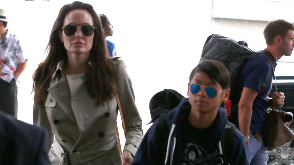 Pax jolie pitt broken leg vacation thailand