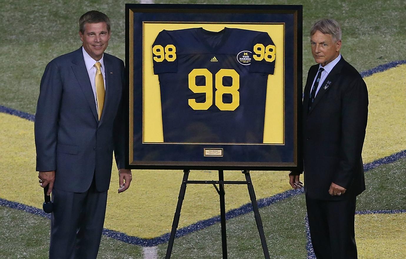 NCIS star Mark Harmon attended a pre-game ceremony at the University of Michigan that honored his father, football legend Tom Harmon. Harmon himself was a huge star athlete at UCLA in the ‘70s.