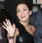 2010__04__Miley_Cyrus_April26newsne 149×150.jpg