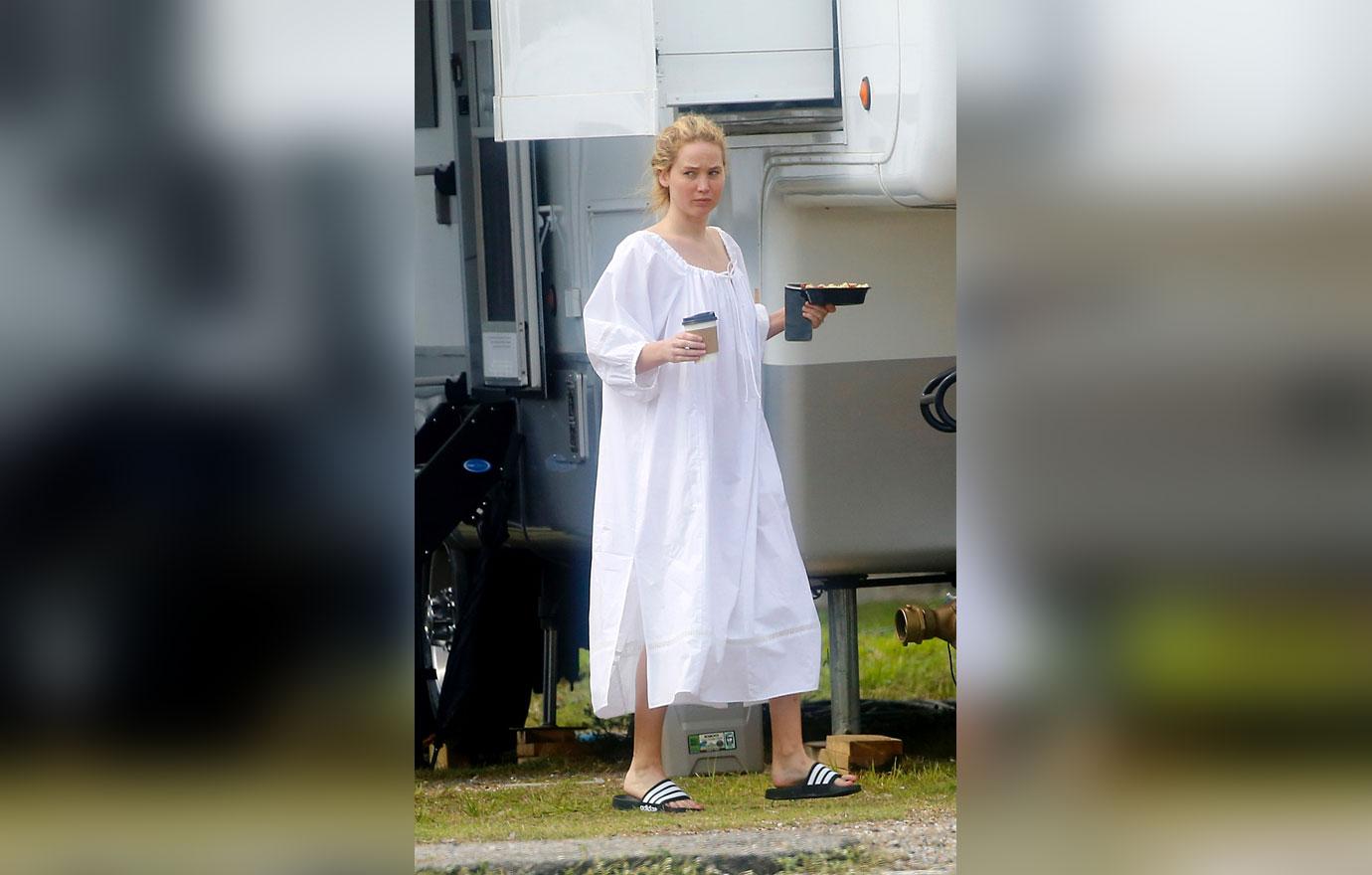 jennifer lawrence arrives on set of red white and water