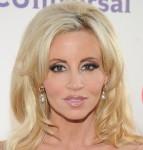 2011__09__Camille Grammer Sept23neb 143×150.jpg