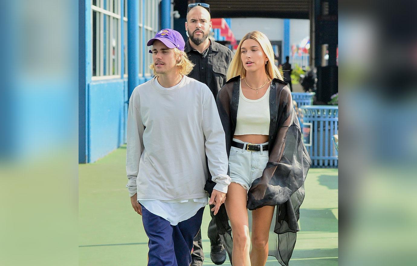 Justin Bieber and Hailey Baldwin go hand in hand walking by the waterside