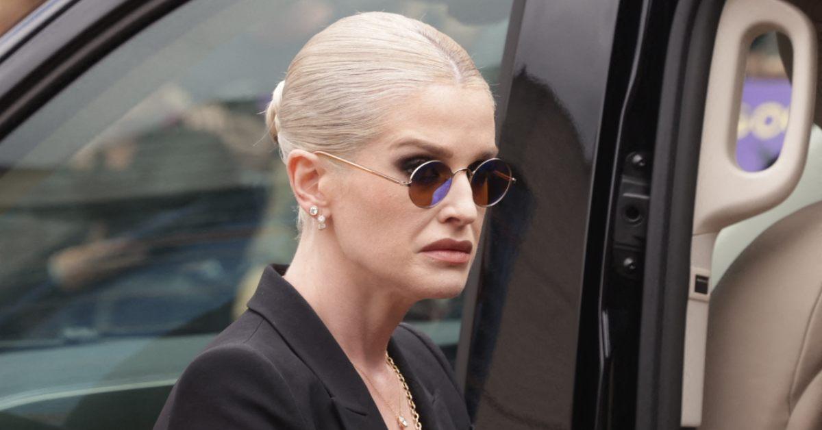 Image of Kelly Osbourne wore dad Ozzy's famous glasses to his funeral.