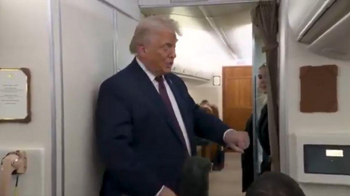 image of Donald Trump addressed the bruise on his left hand while traveling on Air Force One.