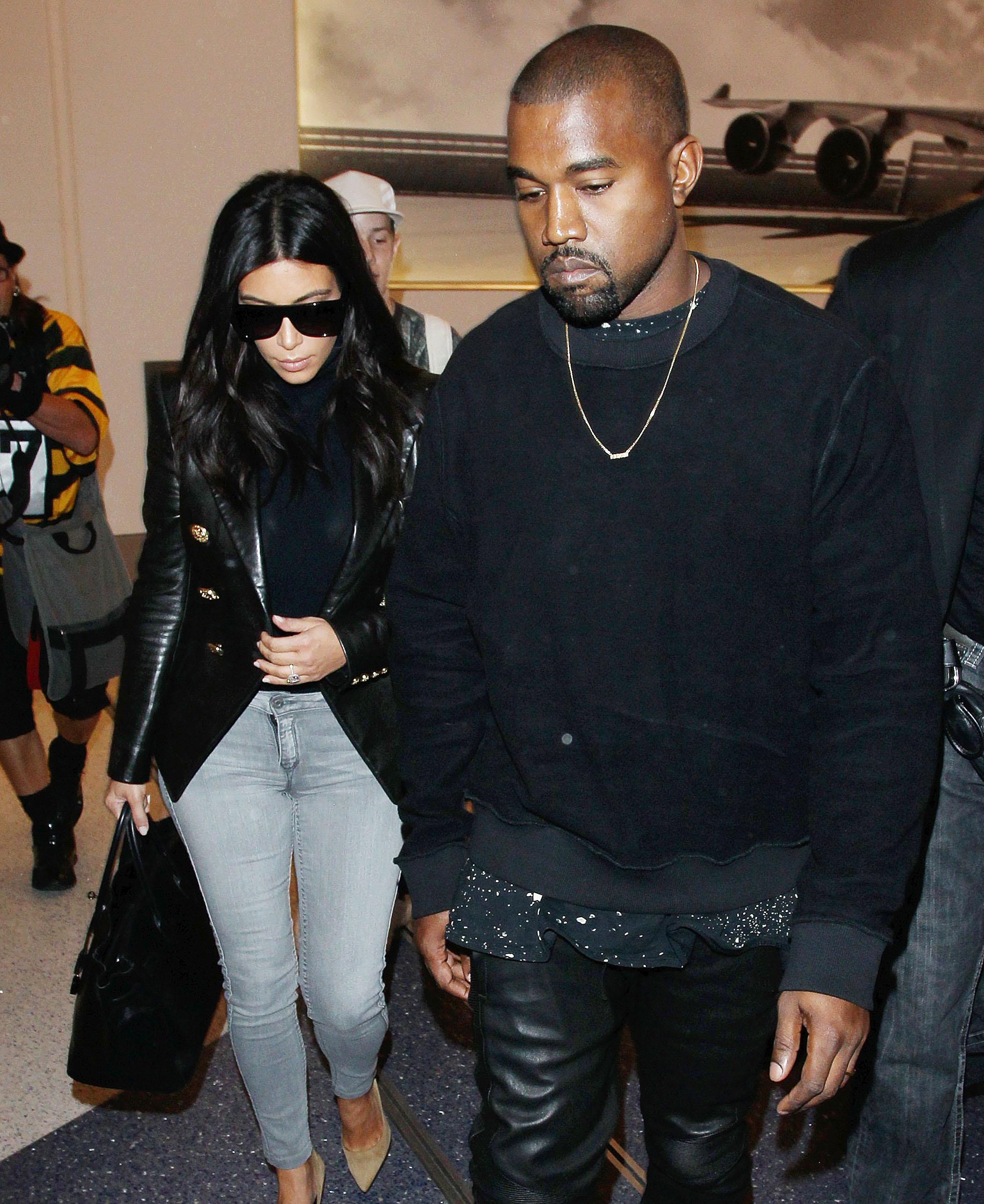 Kim Kardashian and Kanye West spotted arriving at the Los Angeles International Airport ***NO DAILY MAIL SALES***