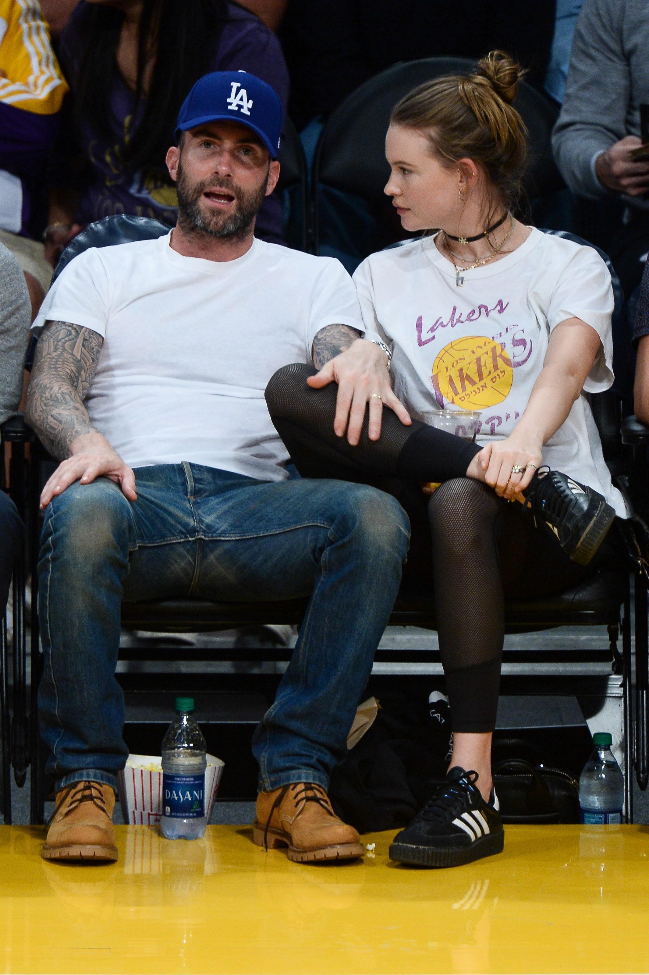 Adam Levine and Behati Prinsloo enjoy the Lakers vs. Warriors game