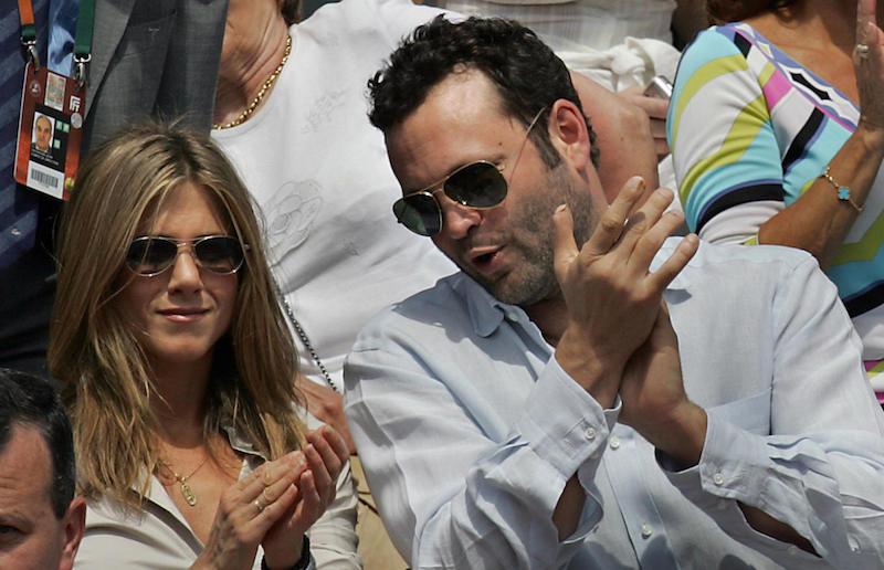 woman and man clapping in sunglasses