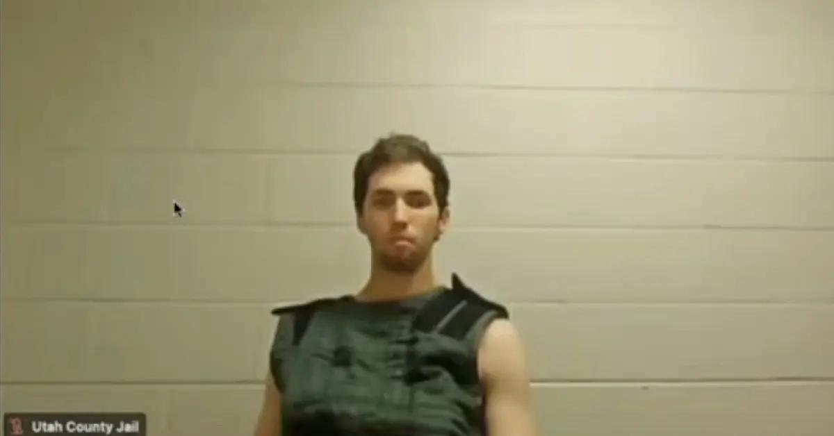 Image of Tyler Robinson appeared via video in his first court hearing, wearing standard suicide prevention garb.