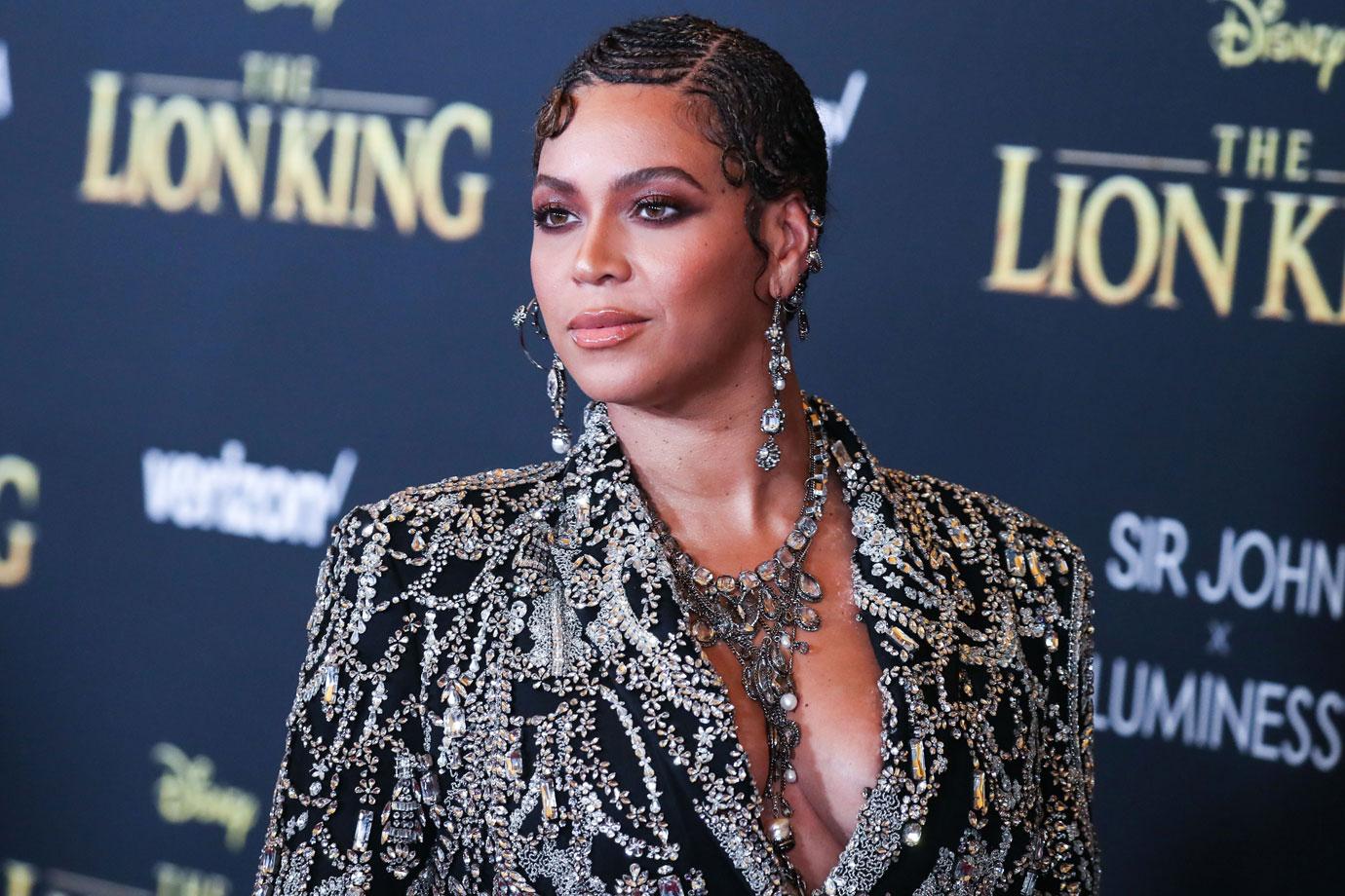 Beyonce Knowles Carter wearing an outfit by Alexander McQueen and Lorraine Schwartz jewelry arrives at the World Premiere Of Disney's 'The Lion King'