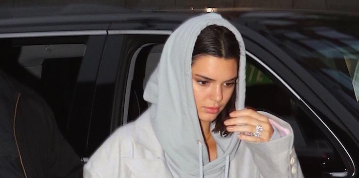 Kendall Jenner shows off a diamond ring on her engagement finger while out with ASAP Rocky