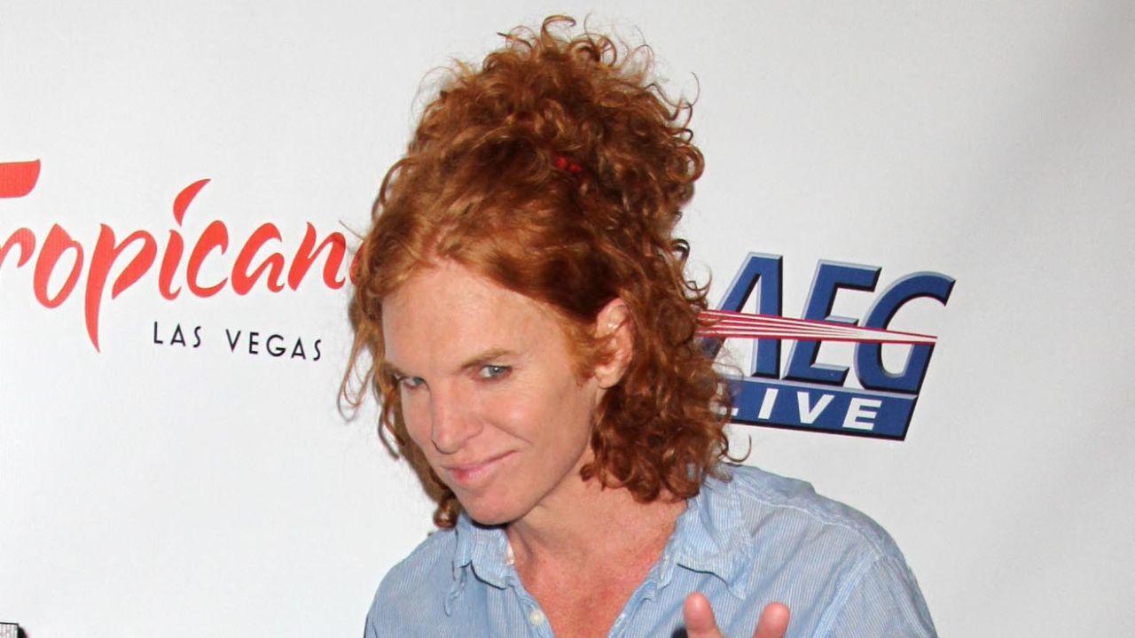 image of Carrot Top's return to the stage comes amid a legal dispute involving singer Brian Evans and allegations surrounding sexually explicit footage.