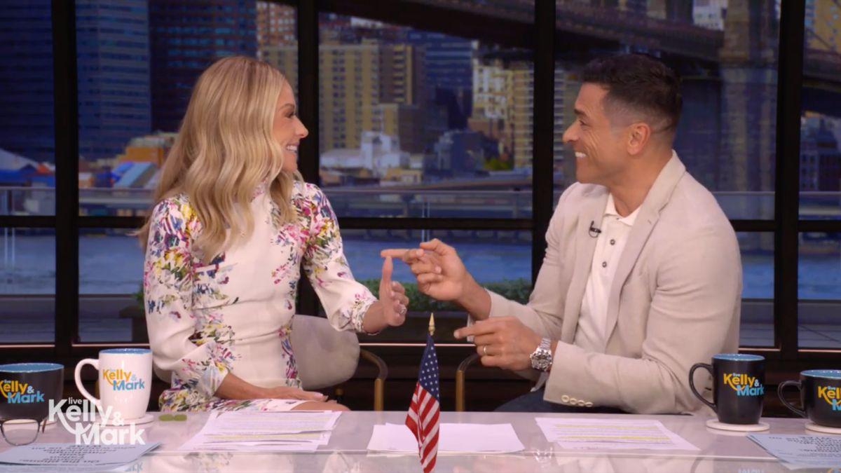 Image of Mark Consuelos saved himself while discussing a dating app for married men.
