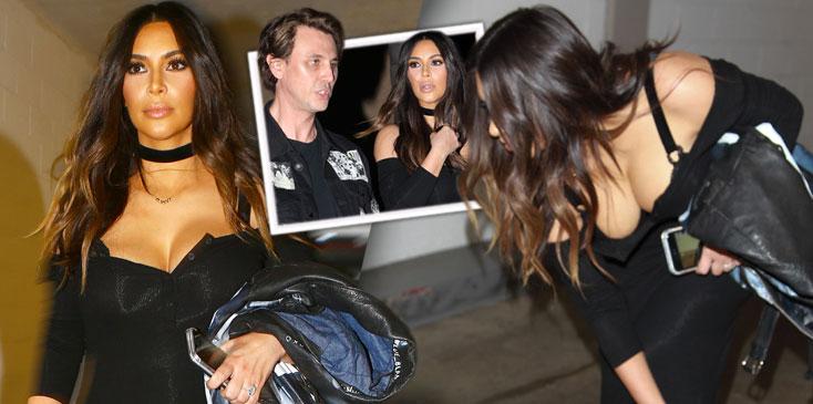 Kim Kardashian makes jaws drop as she spills out of deep cleavage
