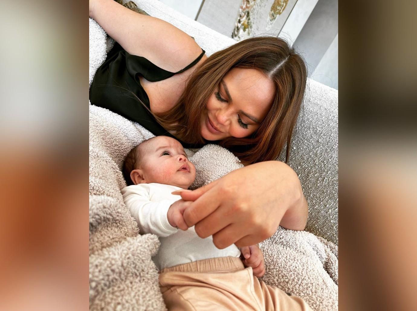 Chrissy Teigen Teases Baby Esti's Adorable Tiny Toes: Photos