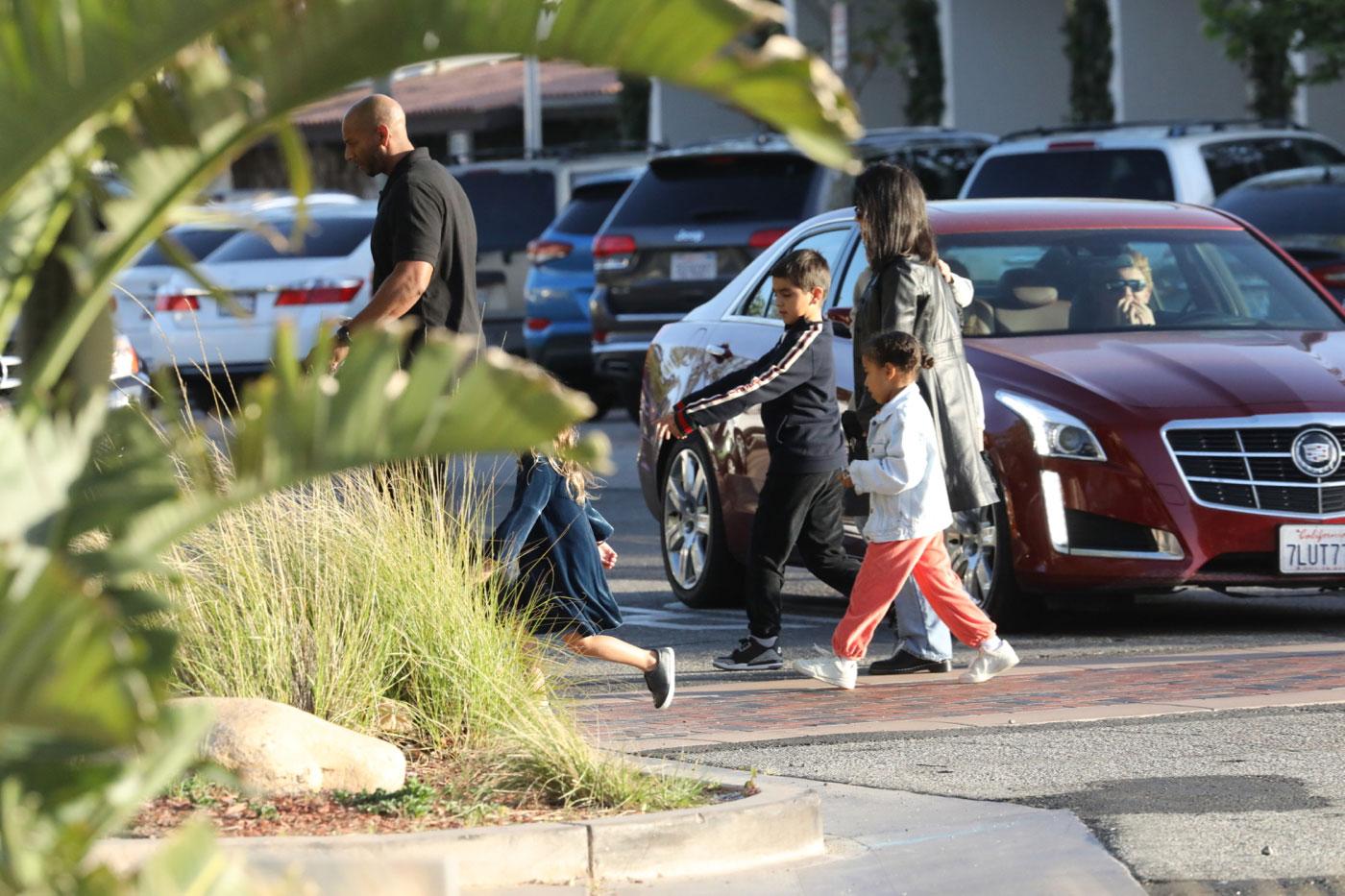 Kourtney Kardashian seen at a restaurant in Malibu with her kids and her nieces.