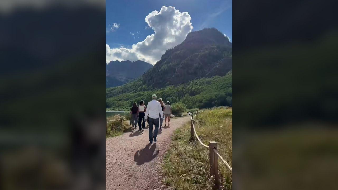 Image of A photo from the reel showed Joanna Gaines and her family hiking through a sun-lit trail during their trip to the mountains.