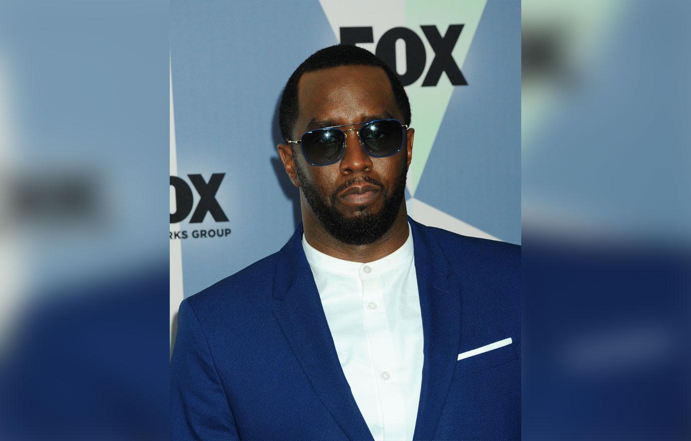 Diddy Wearing Blue Suit