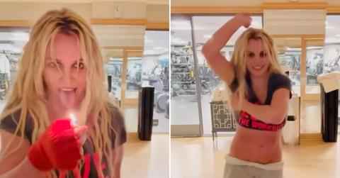 britney spears holds lighter tongue weirdly dancing hips dont lie pp