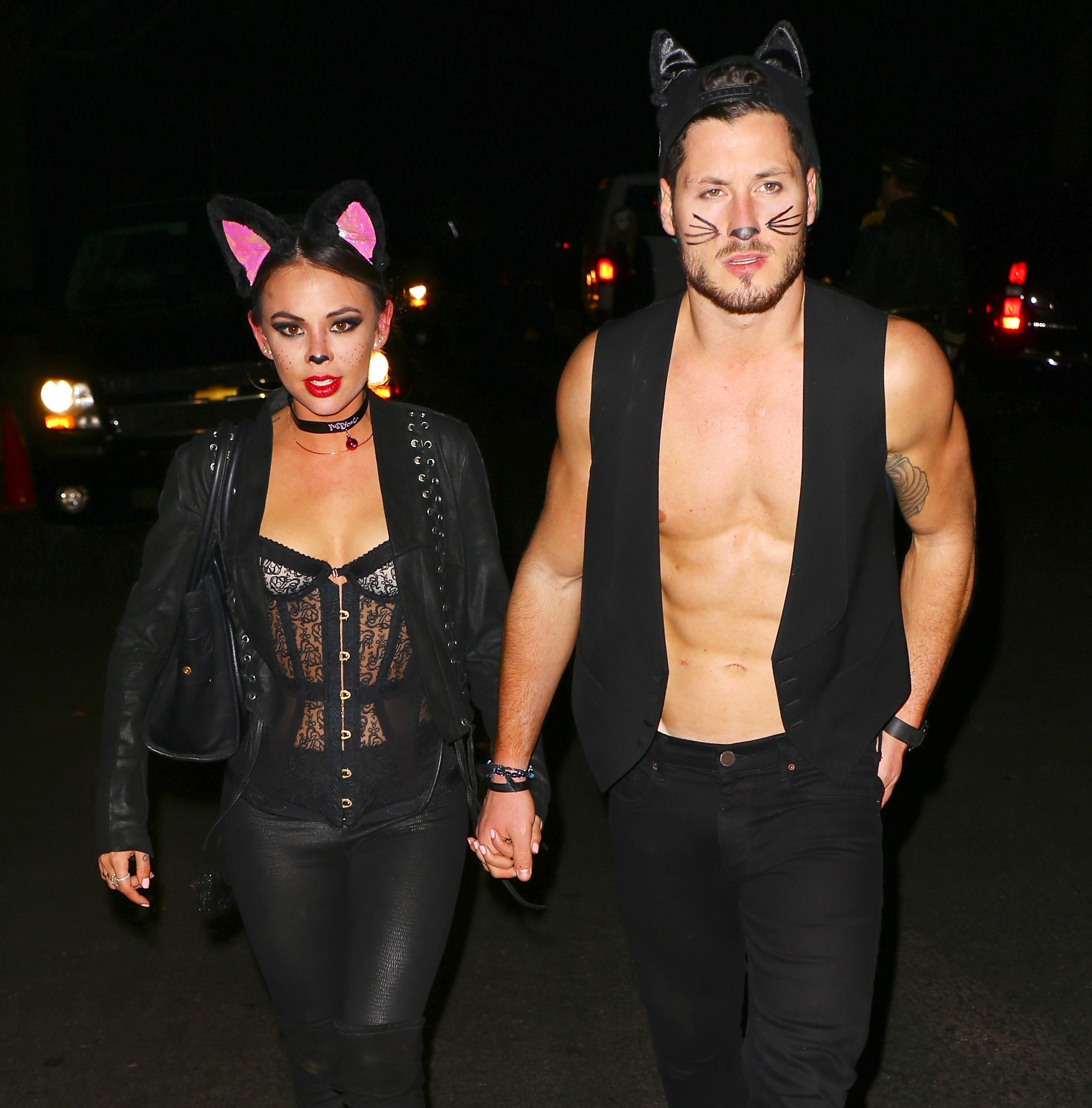Janel Parrish and Val Chmerkovskiy seen holding hands as they leave the Casamigos Halloween party in Beverly Hills