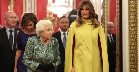 photo of queen elizabeth alongside melania trump