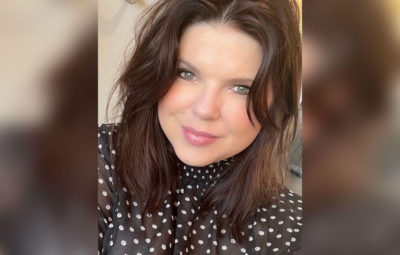 Amy Duggar Flashes Skin In Sleek Black Swimsuit