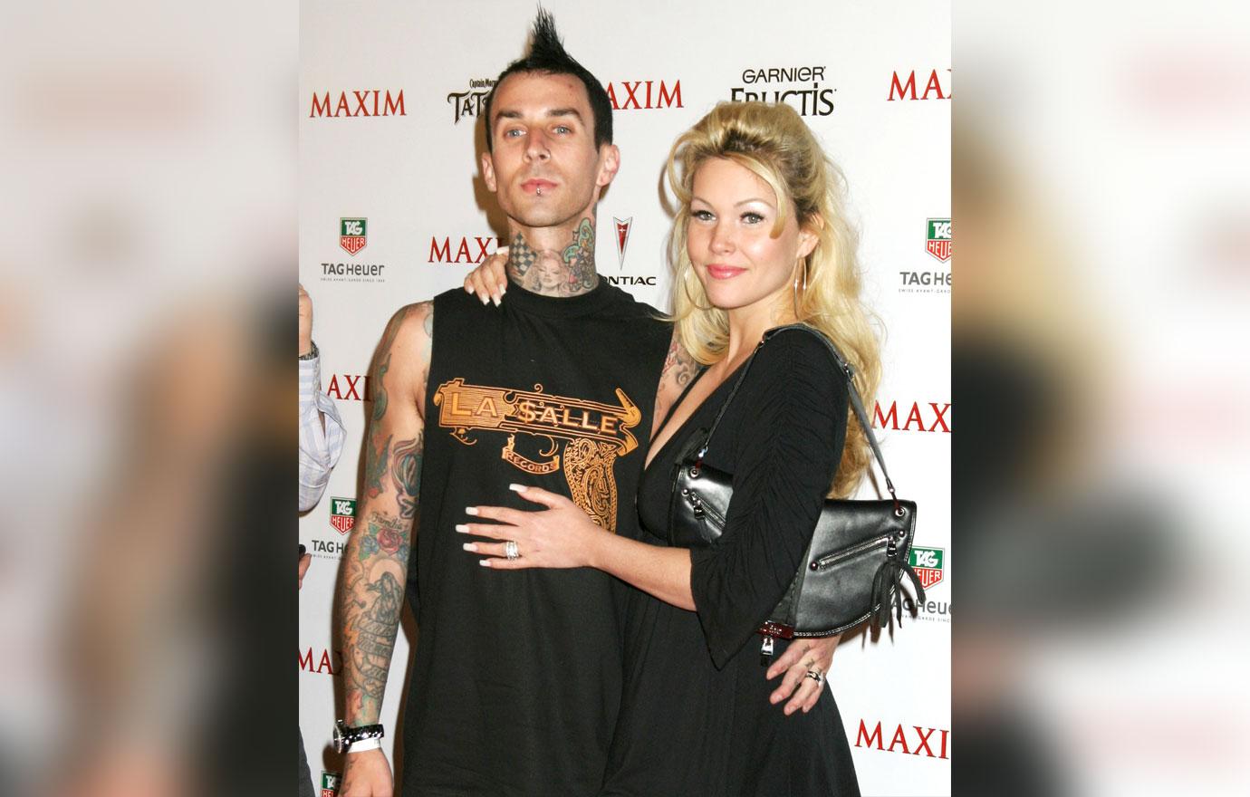 shanna moakler seemingly shades ex travis barker rocker covers tattooed name