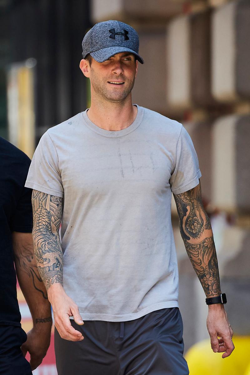 Adam Levine spotted wearing a Under Armour cap while out and about in NYC