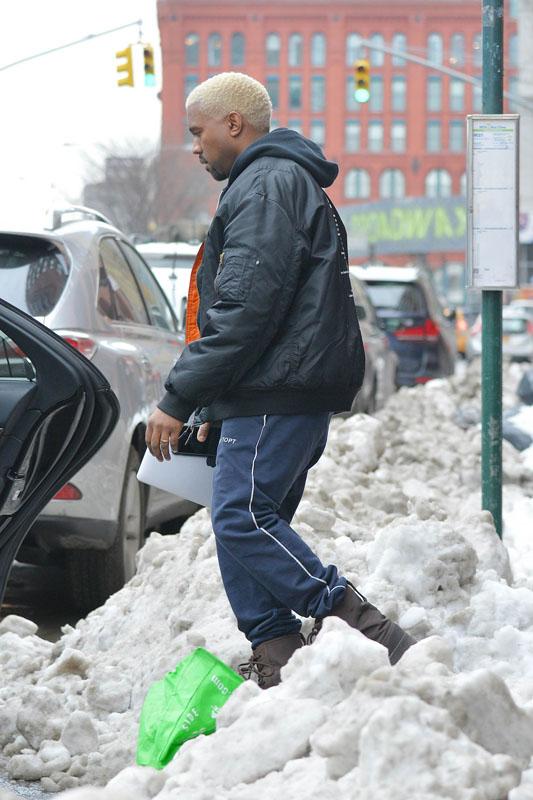 Kanye West shows off his new hair in Soho