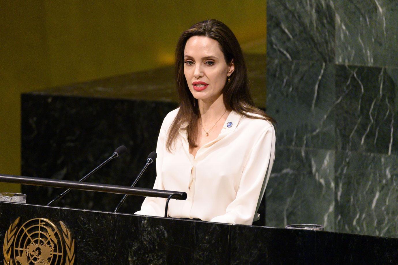 Angelina Jolie Standing At Podium angelina jolie time magazine