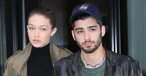 Gigi Hadid and Zayn Malik hold hands as they leave their apartment together