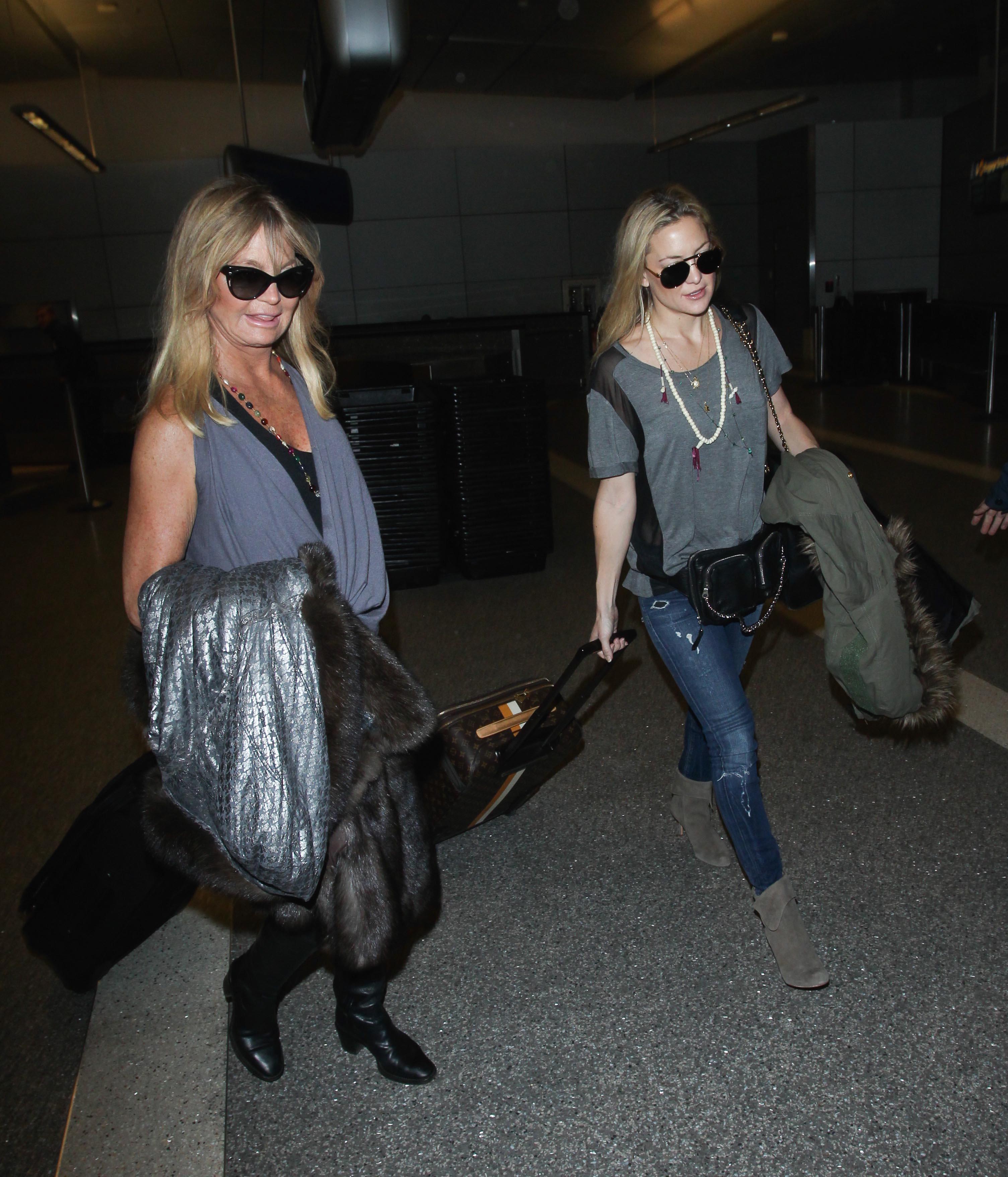 Goldie Hawn arrives at LAX with personalised Louis Vuitton luggage