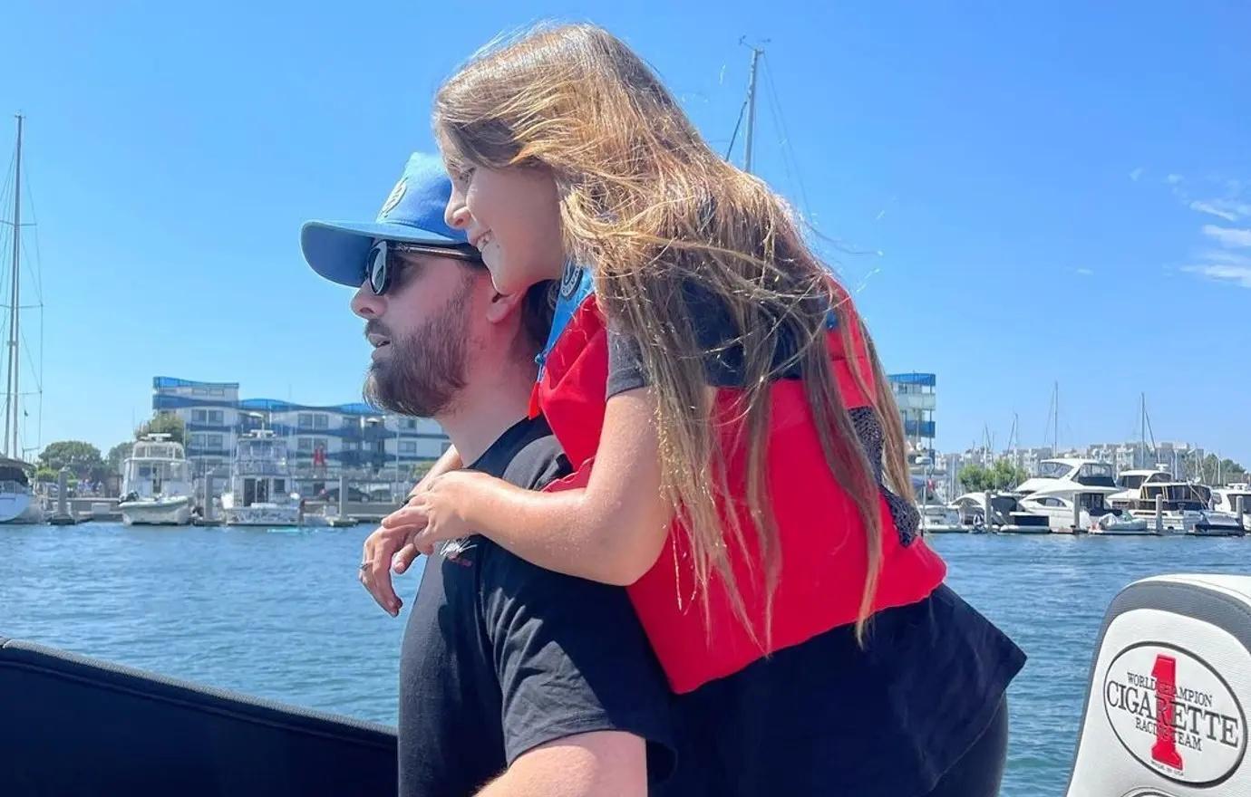 Scott Disick and Amelia Hamlin Cuddle Up on a Boat Ride