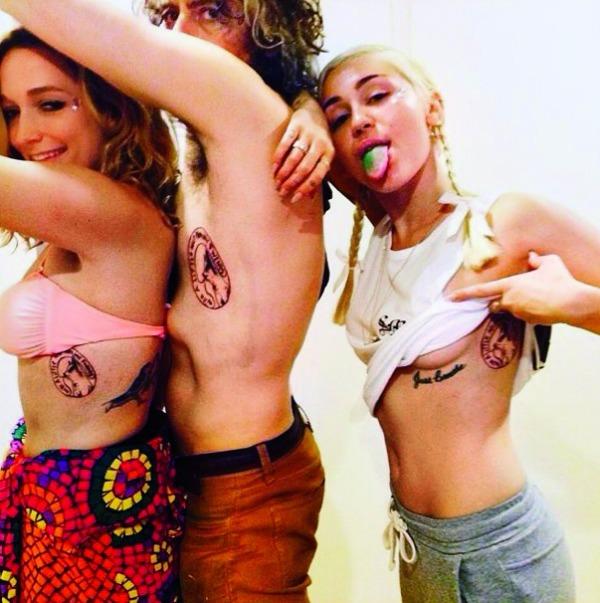 Miley, Wayne Coyne and girlfriend Katy get tattoos for her dead pup Floyd