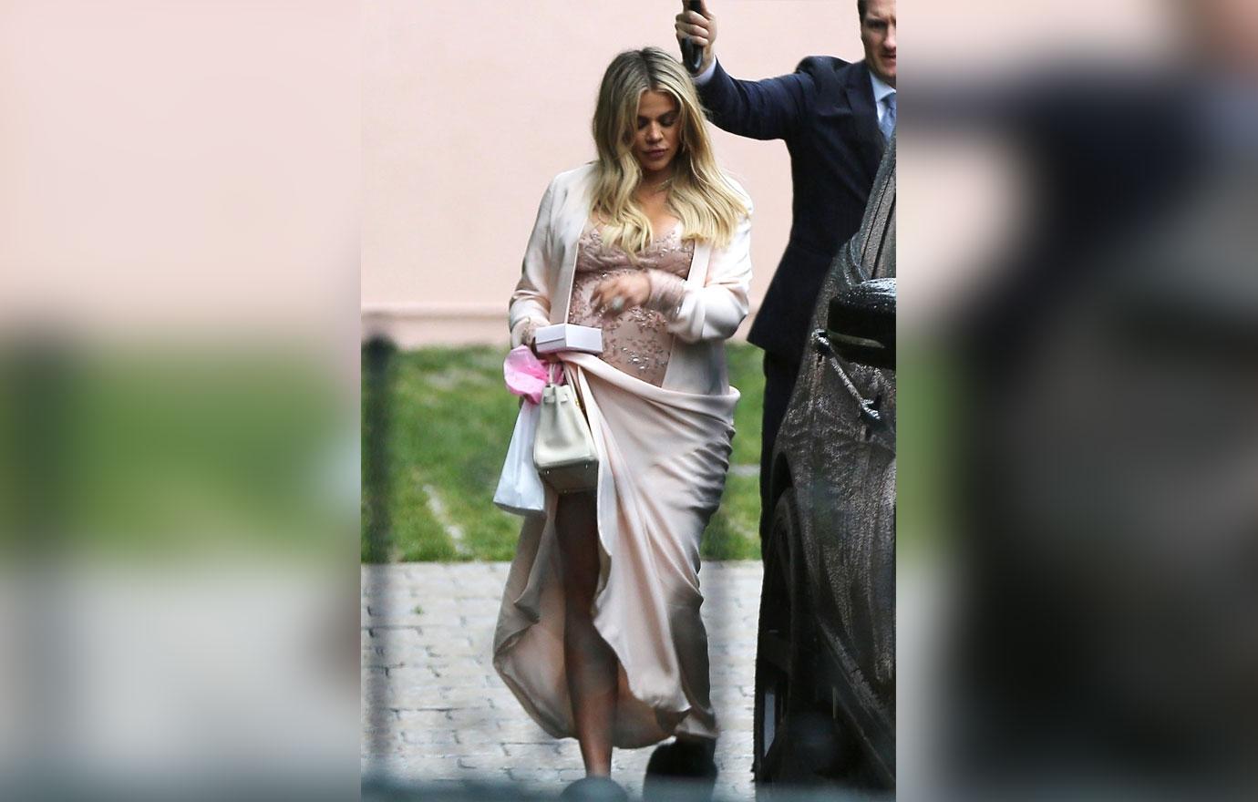 *EXCLUSIVE* Khloe Kardashian looks pretty in pink as she leaves her baby shower with Tristan Thompson