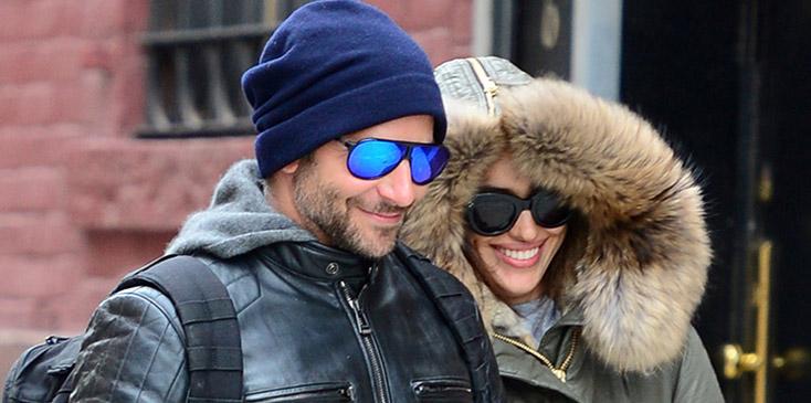 A chatty fan joins Bradley Cooper and girlfriend Irina on their Romantic Walk **USA ONLY**