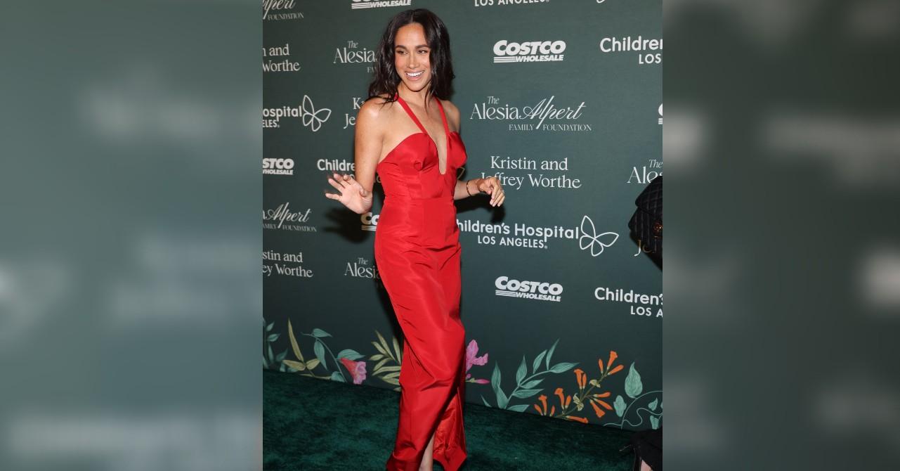 meghan markle stuns plunging red dress during surprise appearance childrens hospital la gala