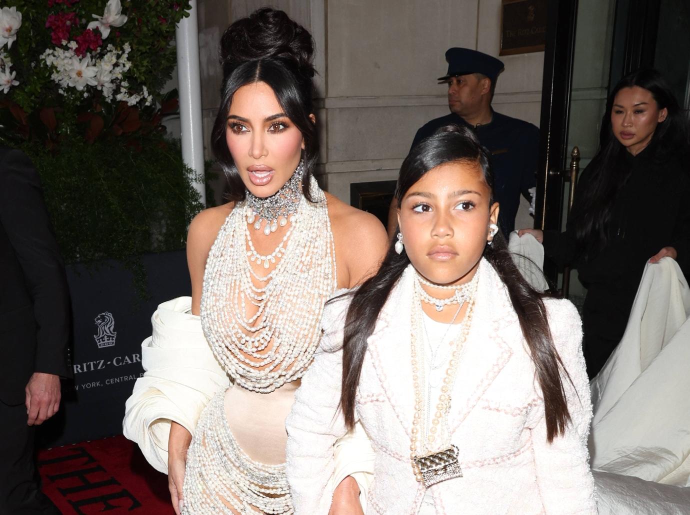 Kim Kardashian dresses adorable mini-me North West in matching dazzling  outfit for night out at daddy's gig