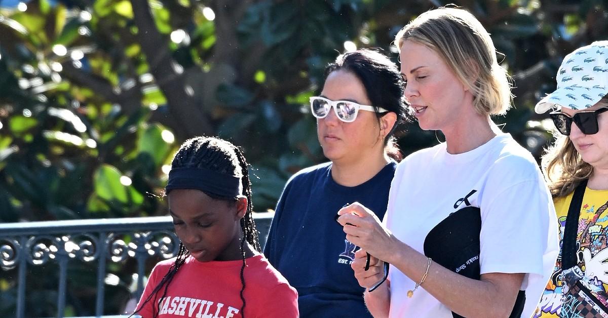 Photo of Charlize Theron took a break from wearing her baseball cap. 