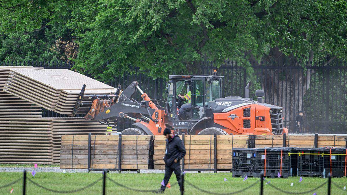 Image of Construction crews reportedly began preparing the White House lawn.