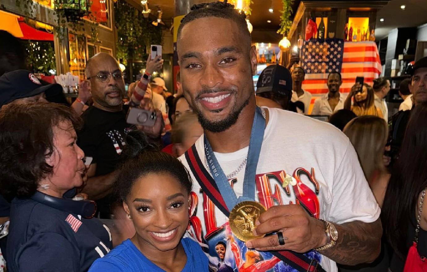 simone biles husband jonathan owens history olympic medal photos