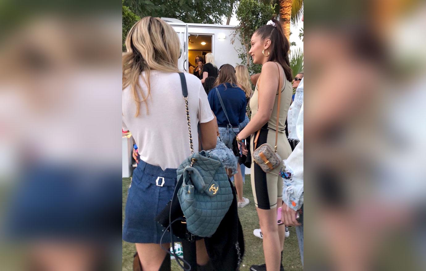 *EXCLUSIVE* Bella Hadid and Hailey Baldwin wait in line for the restroom